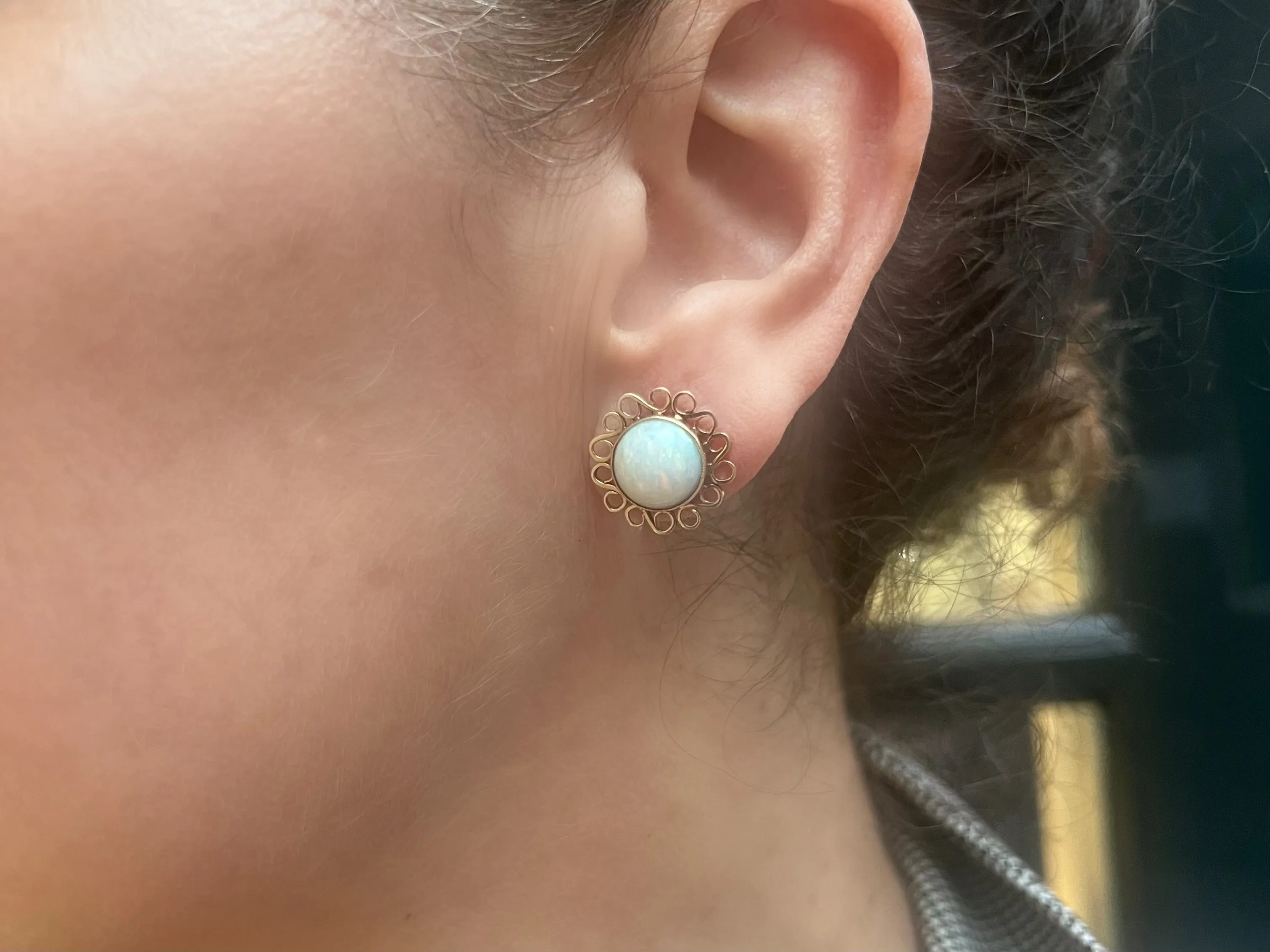 Cabochon opal earrings in 14 carat gold